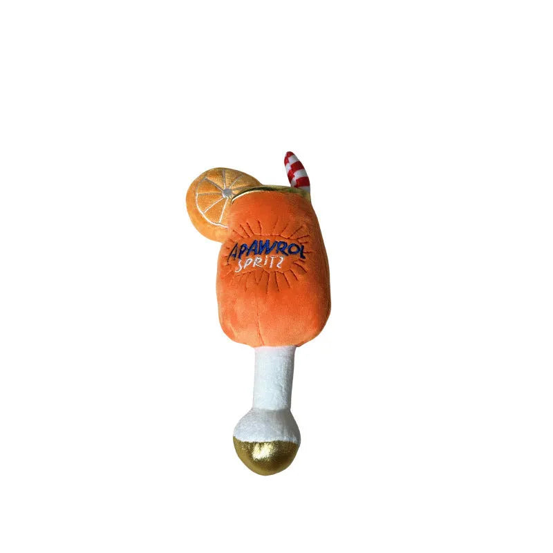 Yellow plush beer bottle cup squeaky dog chew toy on a white background.