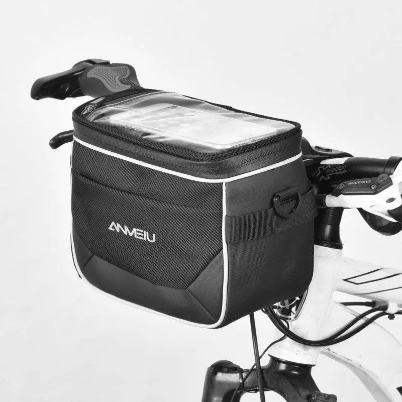 Black folding bicycle handlebar bag with hanging loop, shown attached to bike bars.