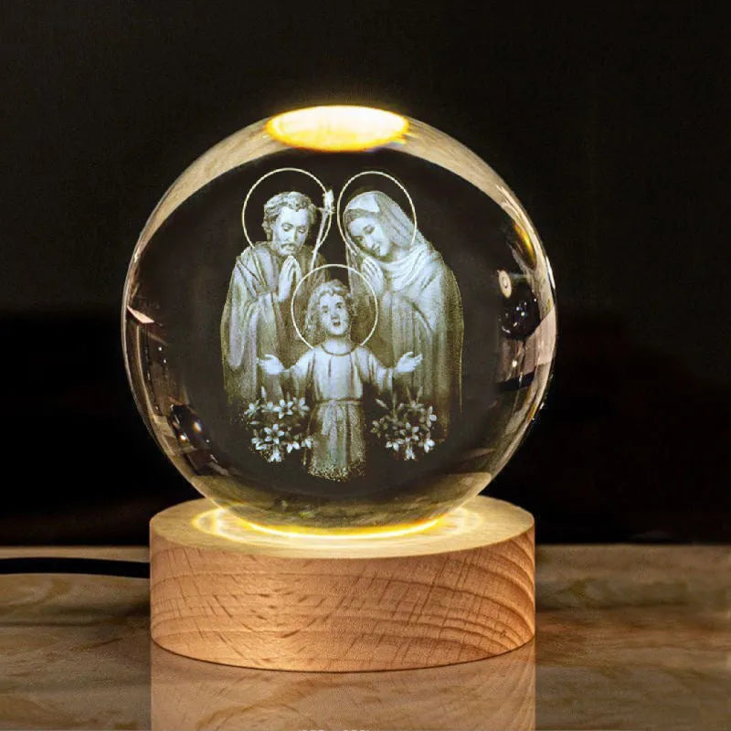 White crystal ball desk ornament on a wooden warm light base, showing purity-themed designs.
