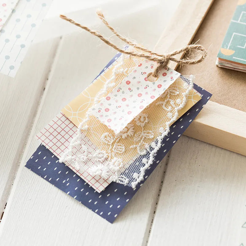 Pack of 50 retro-style decorative note papers with dessert-themed designs in ten colours.