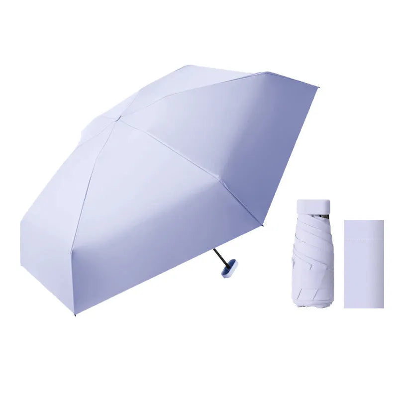 Ultra-light six-fold flat capsule sun protection umbrella in sky blue with rubber handle