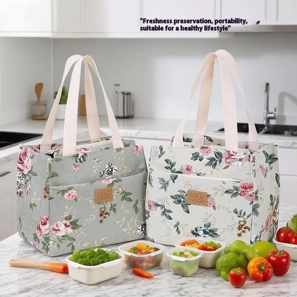 Women's large printed canvas tote bag with aluminium handles in a choice of floral and cat designs.