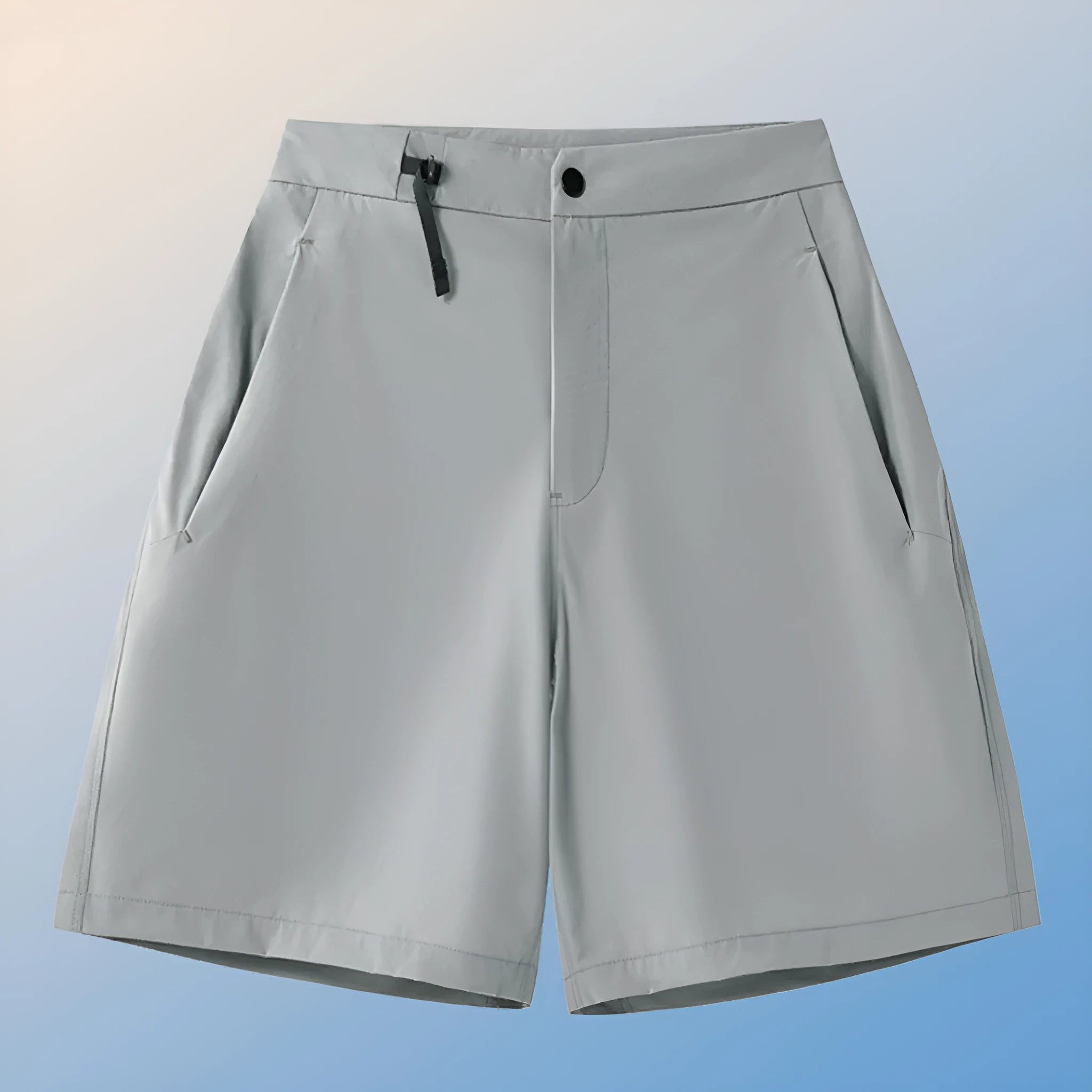 Man wearing khaki athletic shorts with four-way stretch, demonstrating movement for running or climbing.
