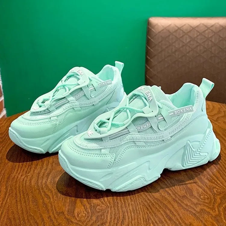 Women's thick-soled casual sneakers with breathable mesh lining and cross belt detail in multiple colours