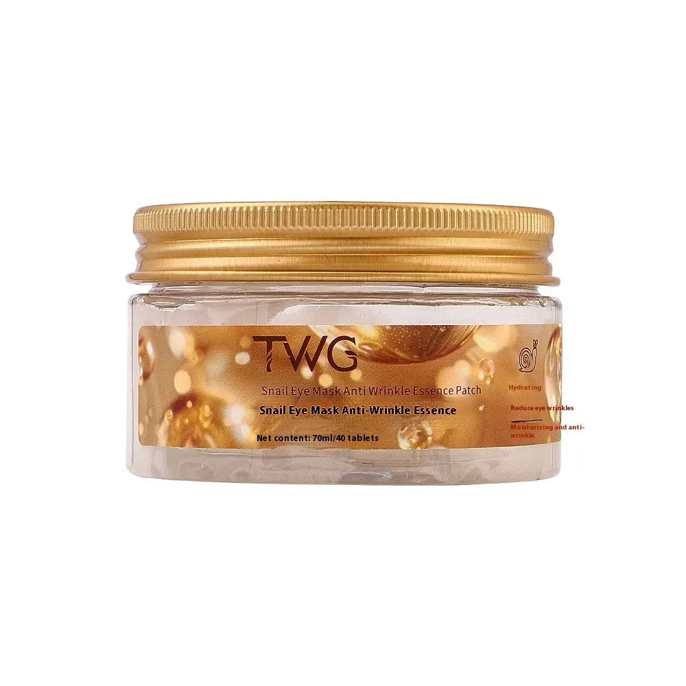 Box of snail essence paste eye mask containing 40 individual tablets for dark circles and fine lines.