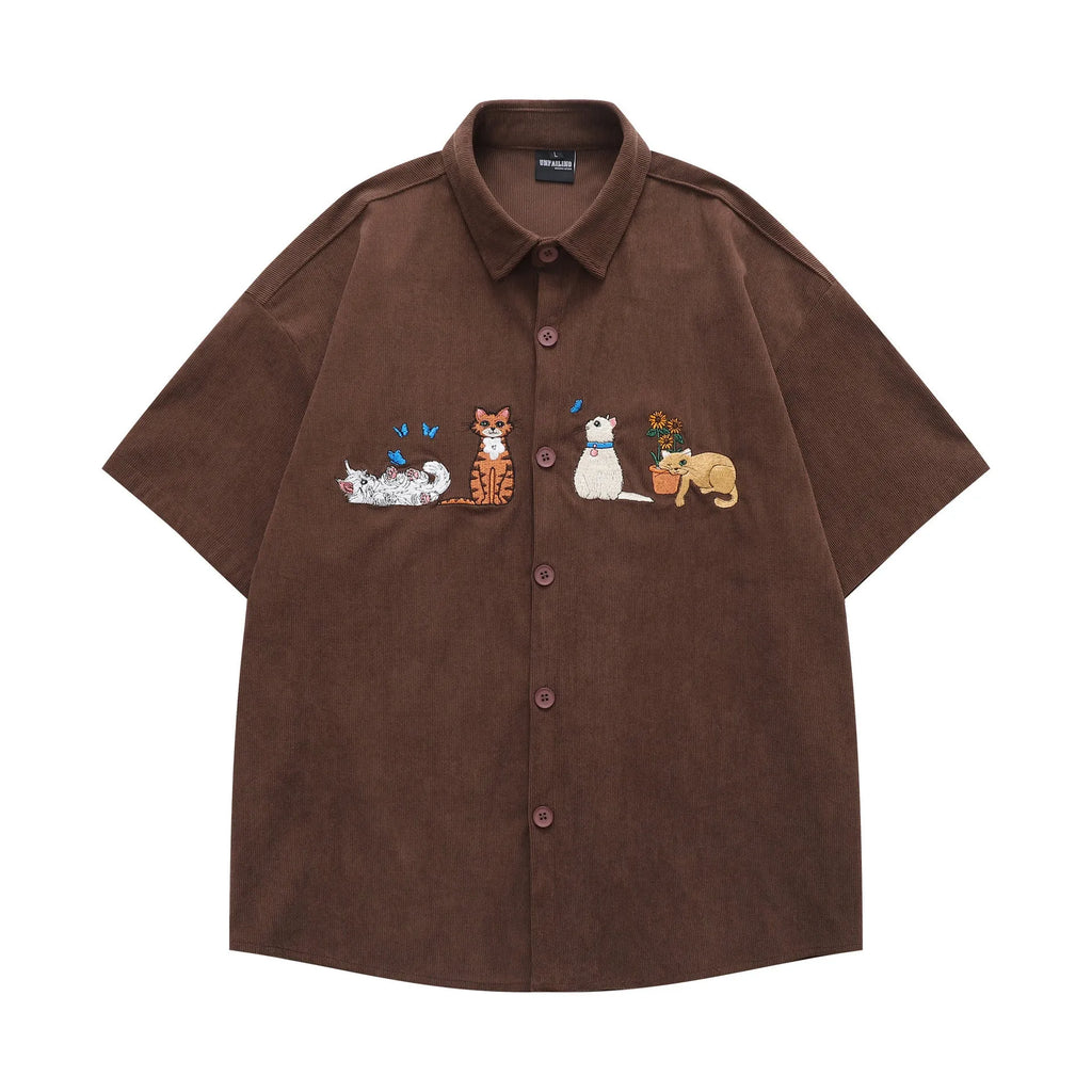 Loose fit cartoon pattern embroidery shirt in apricot colour, cardigan style.