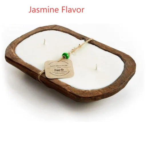 Lavender-scented soy wax candle in a wooden basin with a wooden wick
