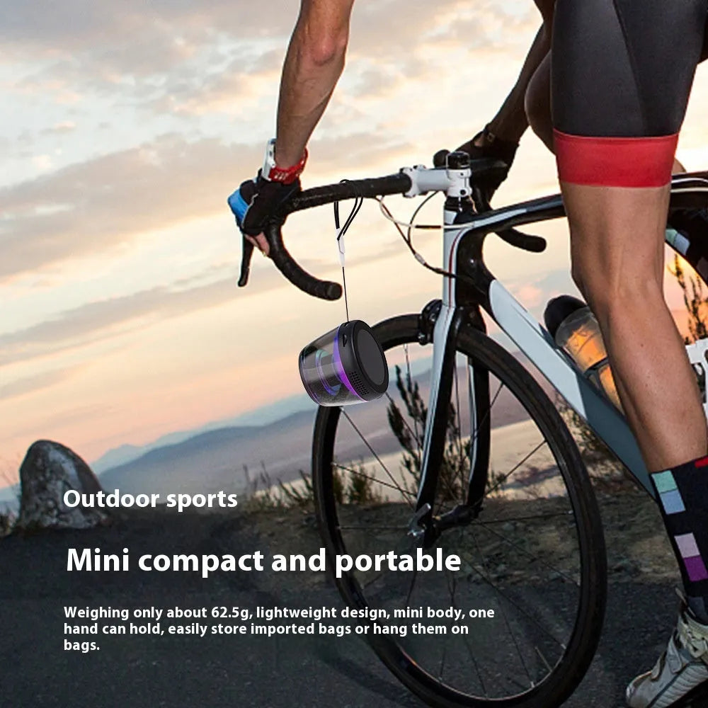 White or black mini Bluetooth speaker with magnetic back, ambient light, and card slot.
