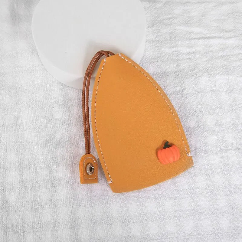 Colourful cartoon PU leather pull-out key case for car keys, shown open and closed