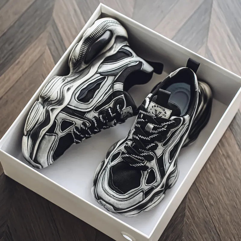 Men's black and white low-top mesh sneakers with a platform sole and lace-up front.