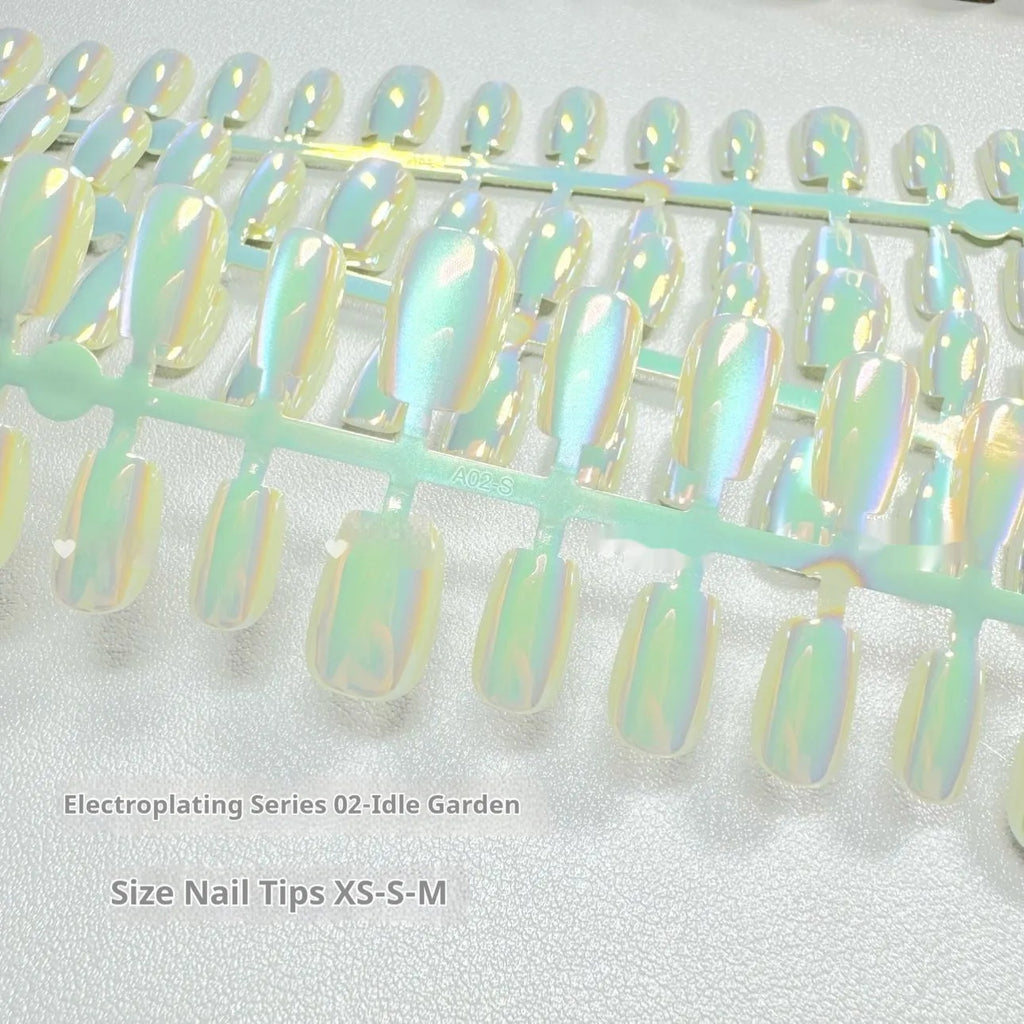 Electroplated Cat's Eye aurora armour false nail set in short ladder sizes XS, S, M.