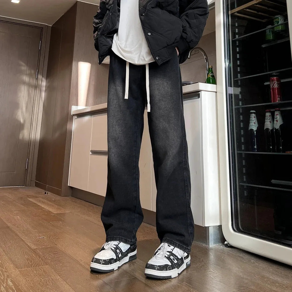 Men's straight-leg cotton denim trousers in blue with drawstring waist and loose fit