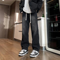 Men's straight-leg cotton denim trousers in blue with drawstring waist and loose fit