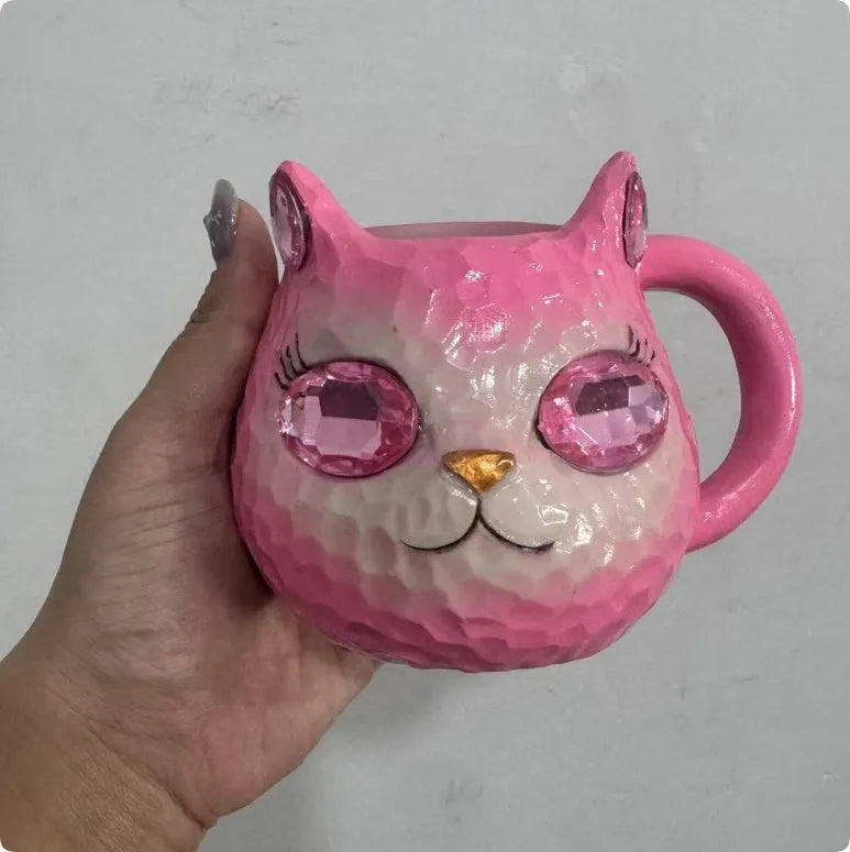 Resin Crystal Earth Cat Cup decorative ornament in purple, green, blue, and pink colour options.