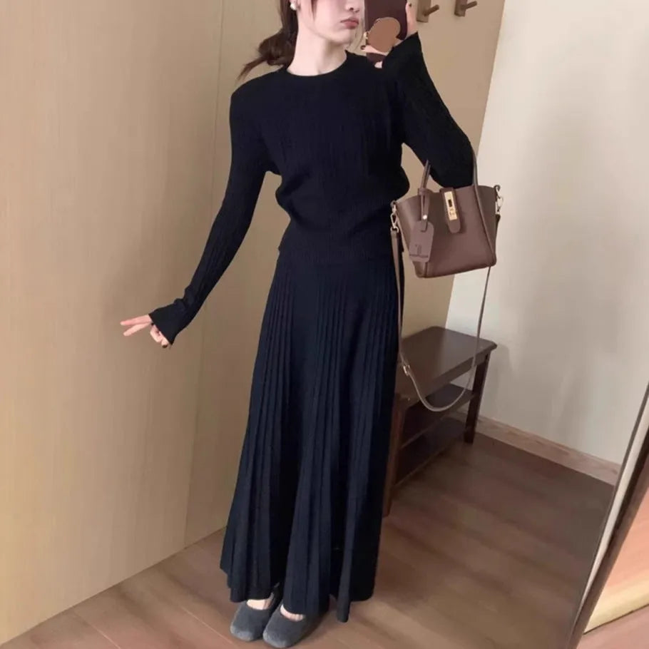 Women's dark grey knitted dress suit with 3D pattern, artistic retro style two-piece set.
