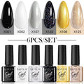 UV gel nail polish set with multiple colour bottles including nude and glitter options for nail art