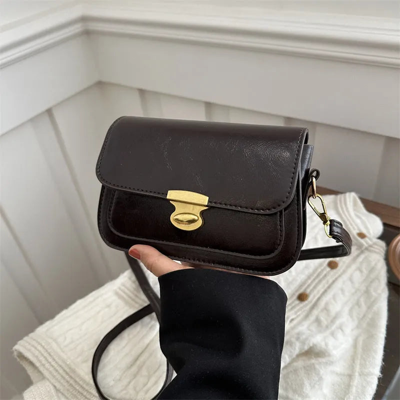 Retro square crossbody bag in PU leather with horizontal suitcase shape, 25 cm width