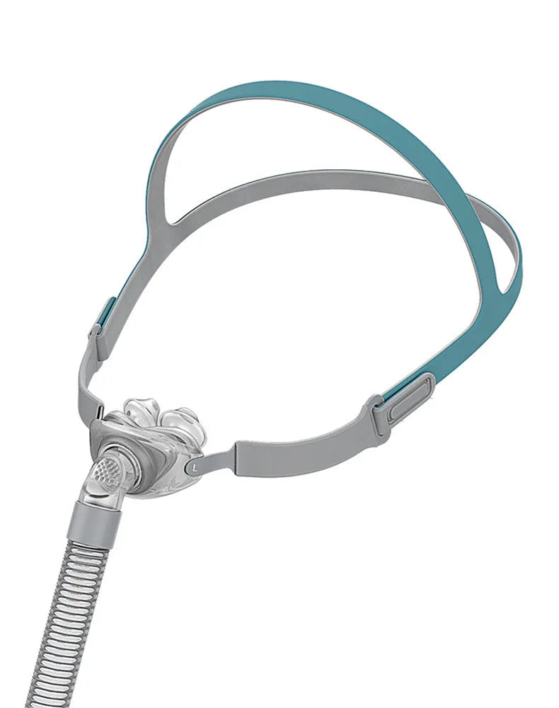 CPAP nasal pillow mask with silicone cushions and adjustable headband for sleep apnoea therapy