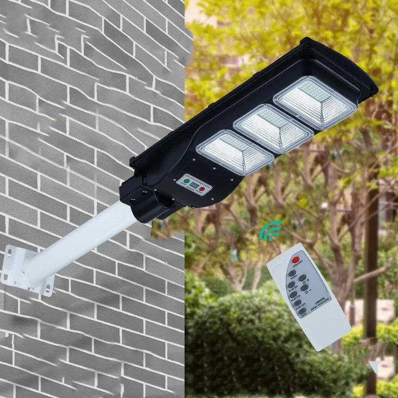 Integrated solar-powered 60W LED street light unit with remote control for outdoor gardens.