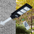 Integrated solar-powered 60W LED street light unit with remote control for outdoor gardens.