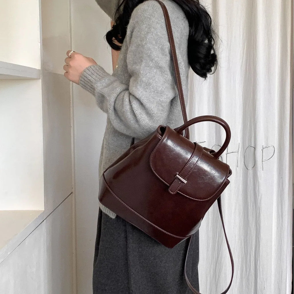 Pibai daily small backpack for women in brown with PU spliced design and compact size