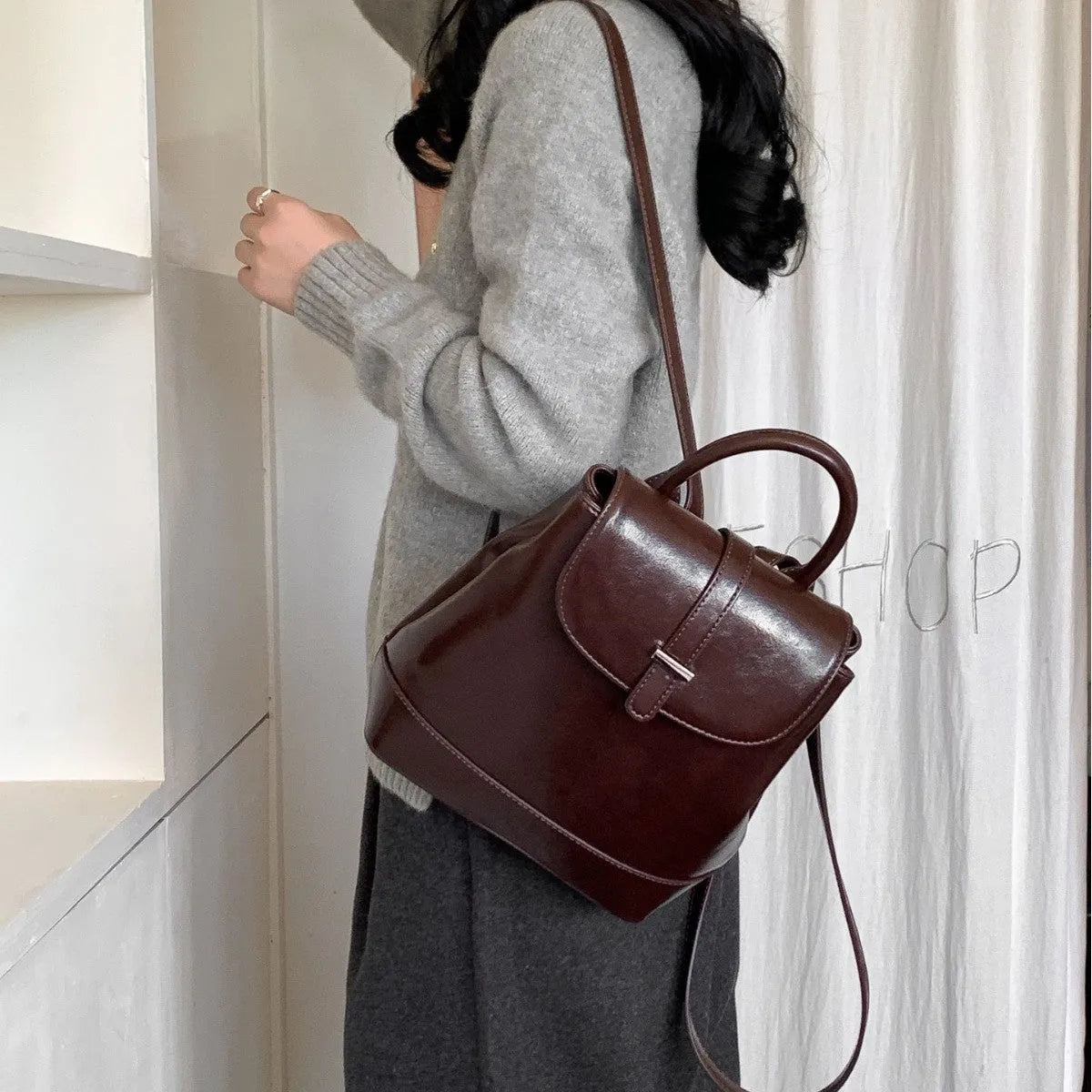 Pibai daily small backpack for women in brown with PU spliced design and compact size