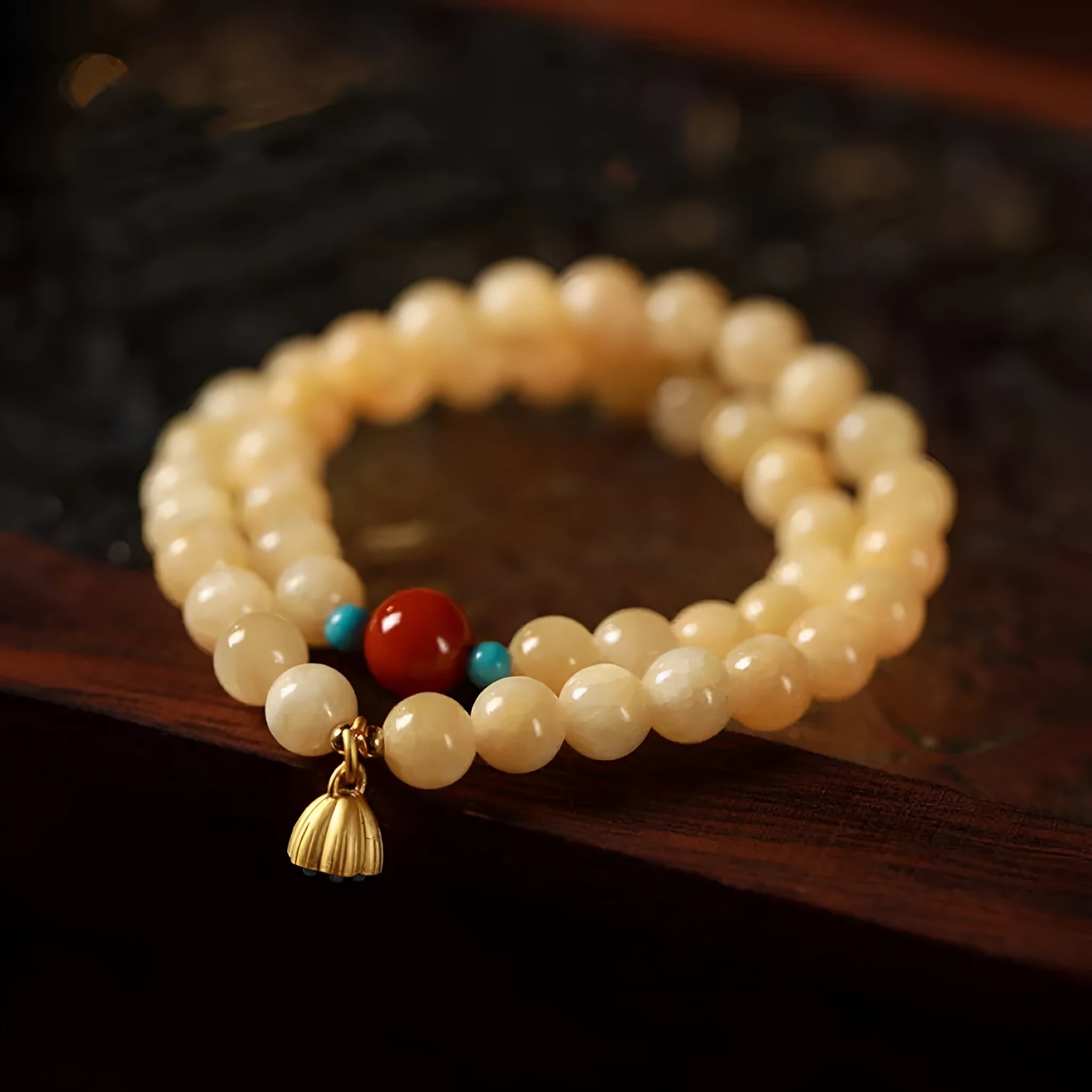 Handmade yellow jade double ring bracelet for women on a wrist, showing 6mm and 8mm size options.