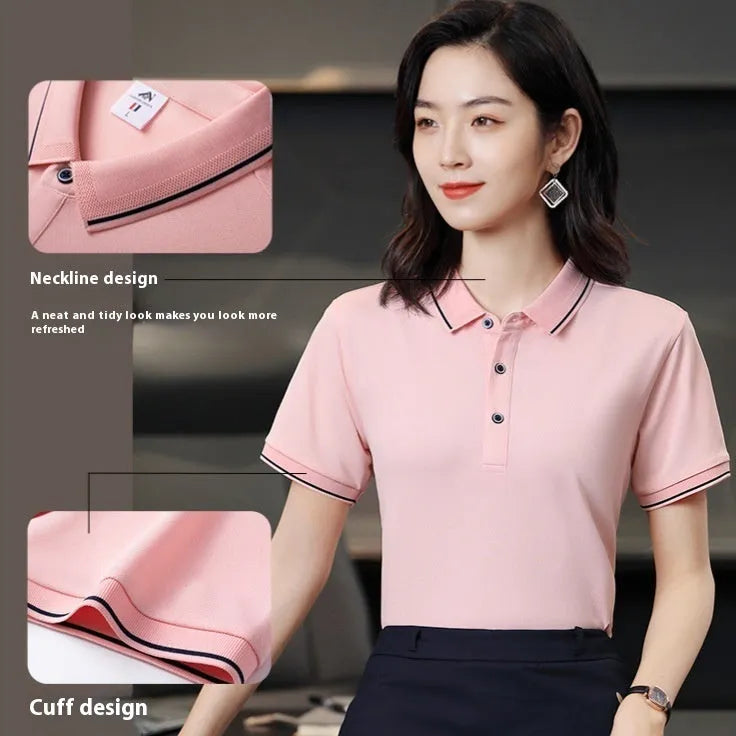Beautician wearing a short-sleeved light blue polo shirt with asymmetric detail in a salon setting