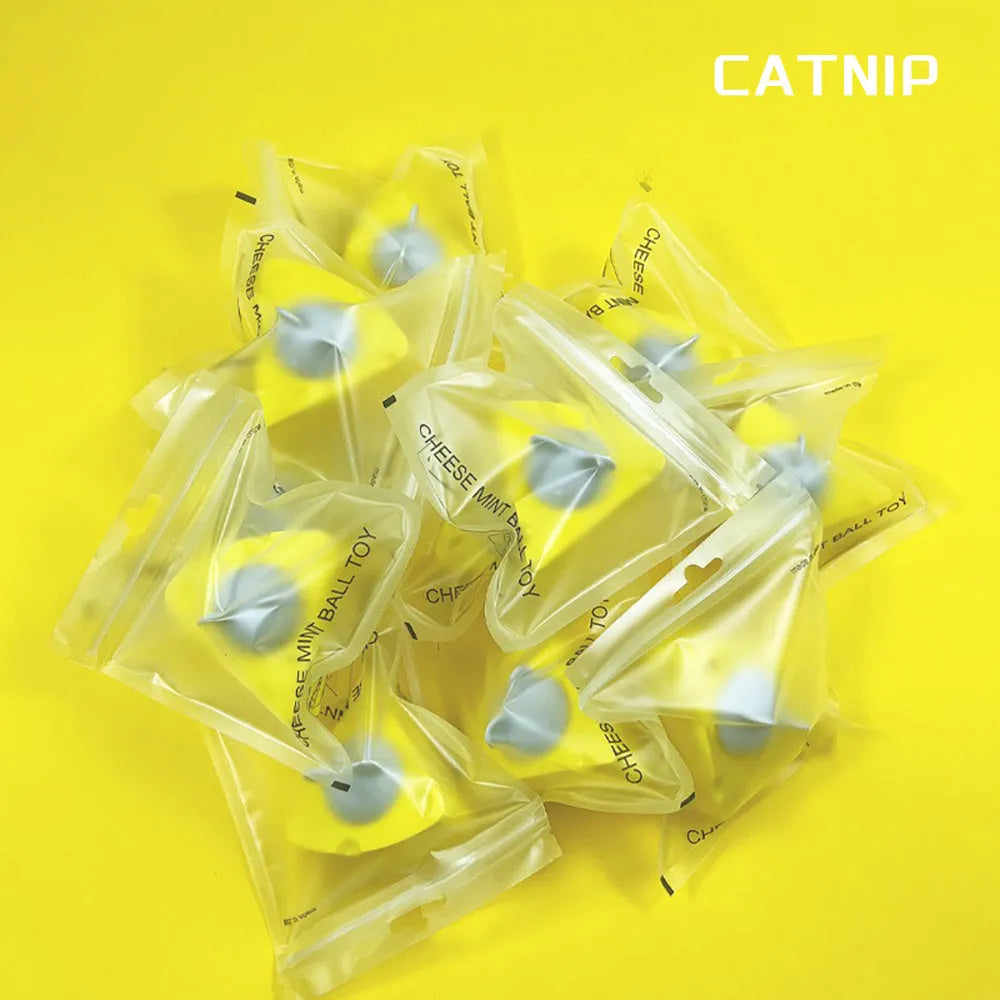 Yellow cheese-shaped cat toy ball with natural catnip and silvervine for chewing and play