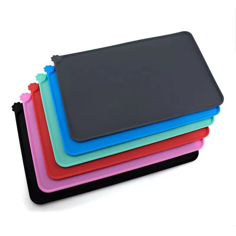 Silicone pet feeding placemat in blue colour under a dog bowl