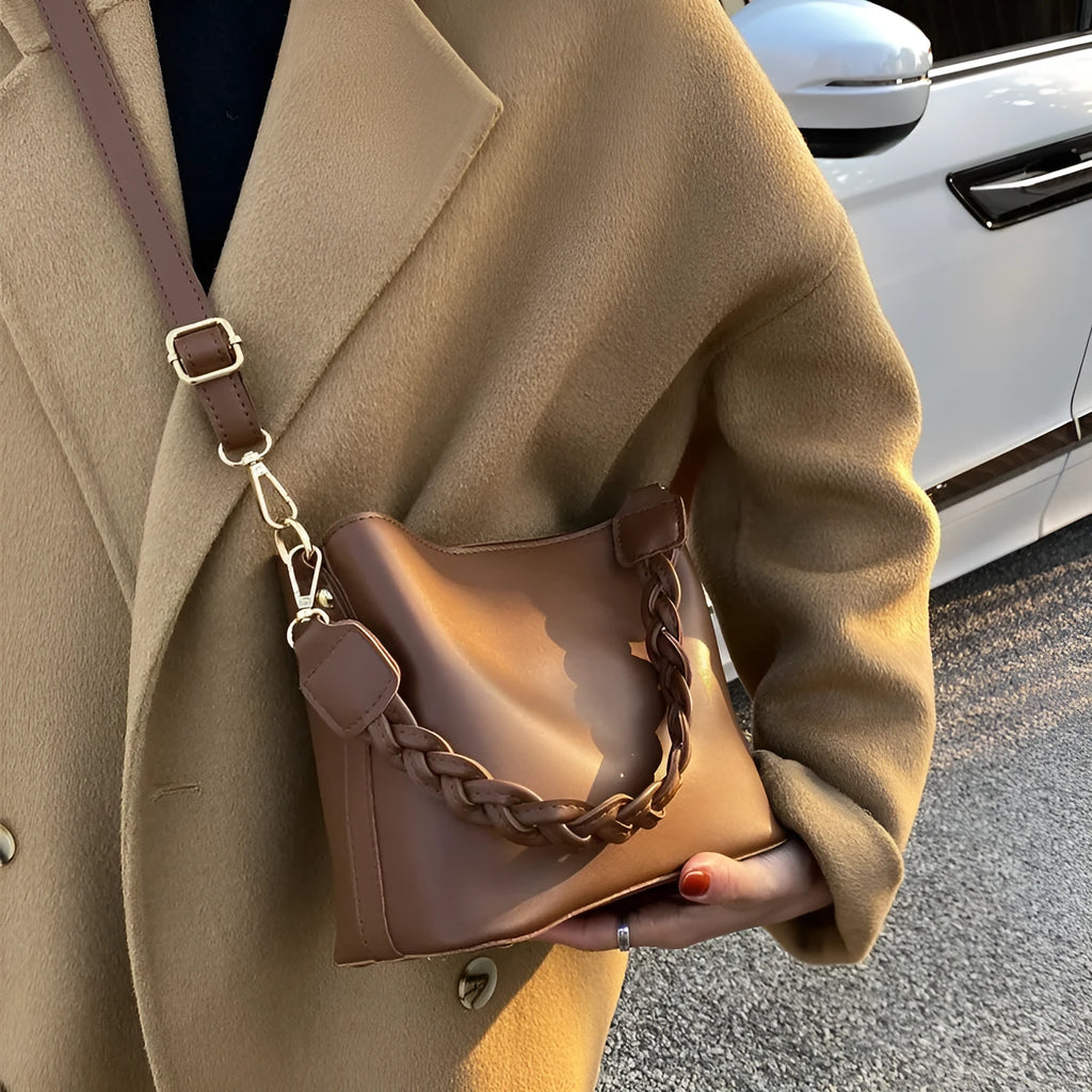 Retro one-shoulder crossbody bucket bag in woven PU material, shown in khaki colour.
