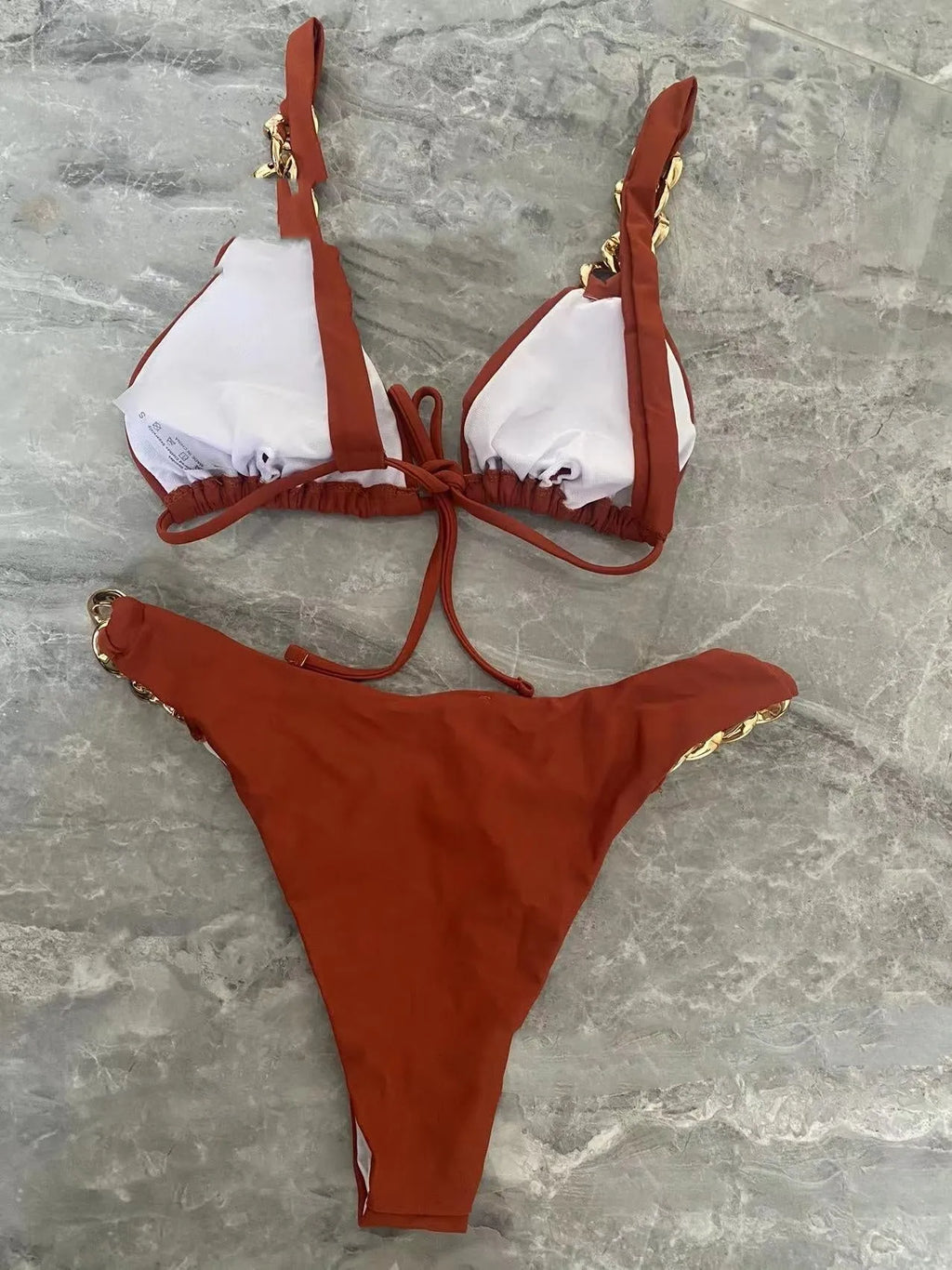Brown women's tube-top push-up bikini with adjustable halter neck ring and split skirt design.