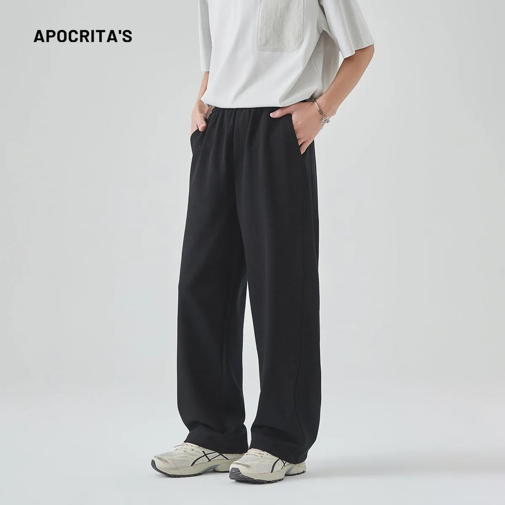 Men's grey cotton blend trousers with lace-up front and straight-leg fit