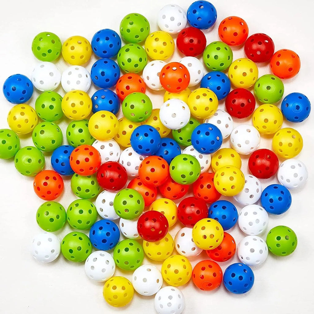Assortment of red, orange, blue, green, white, and yellow 42mm golf practice balls in a net.