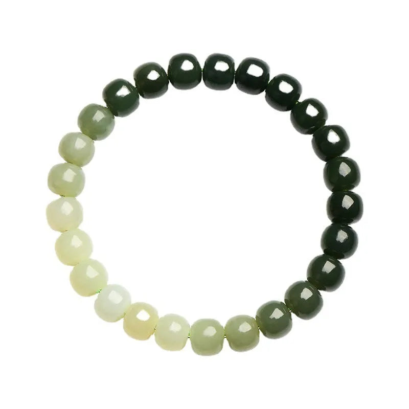 Natural Hetian jade bracelet with water gradient colour on polished beads.