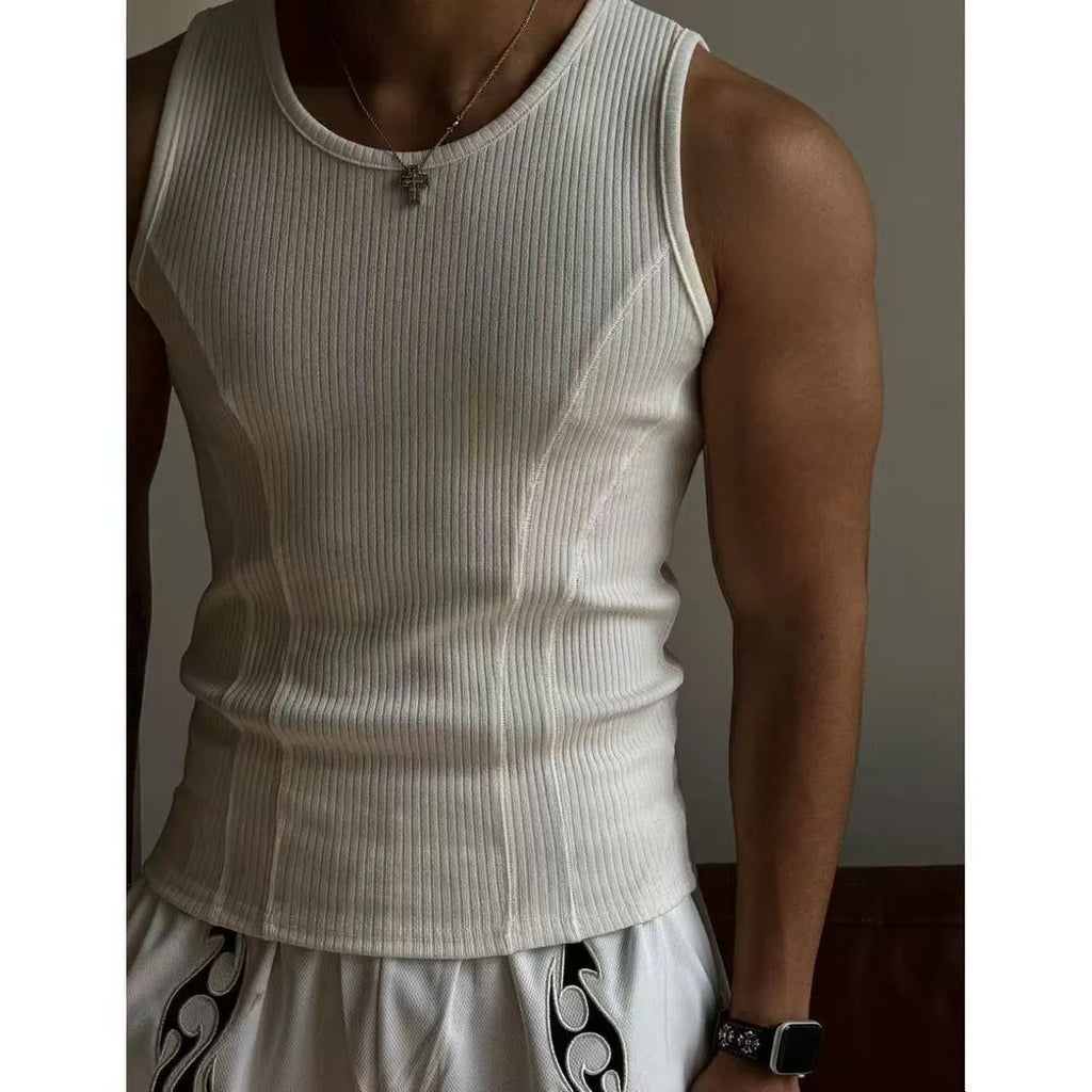 Black men's tight-fitting I-vest tank top with American stitching on a plain background.