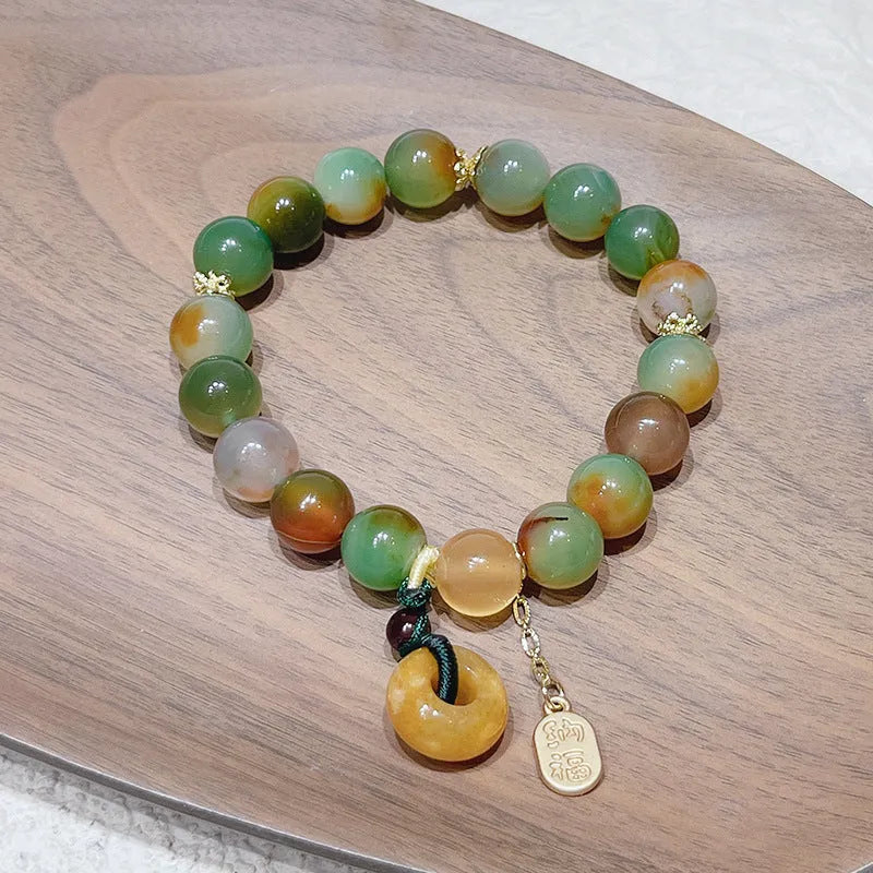 Yellow Lutong agate bracelet with peacock agate and topaz elements, peace buckle clasp, 1cm width women's jewellery