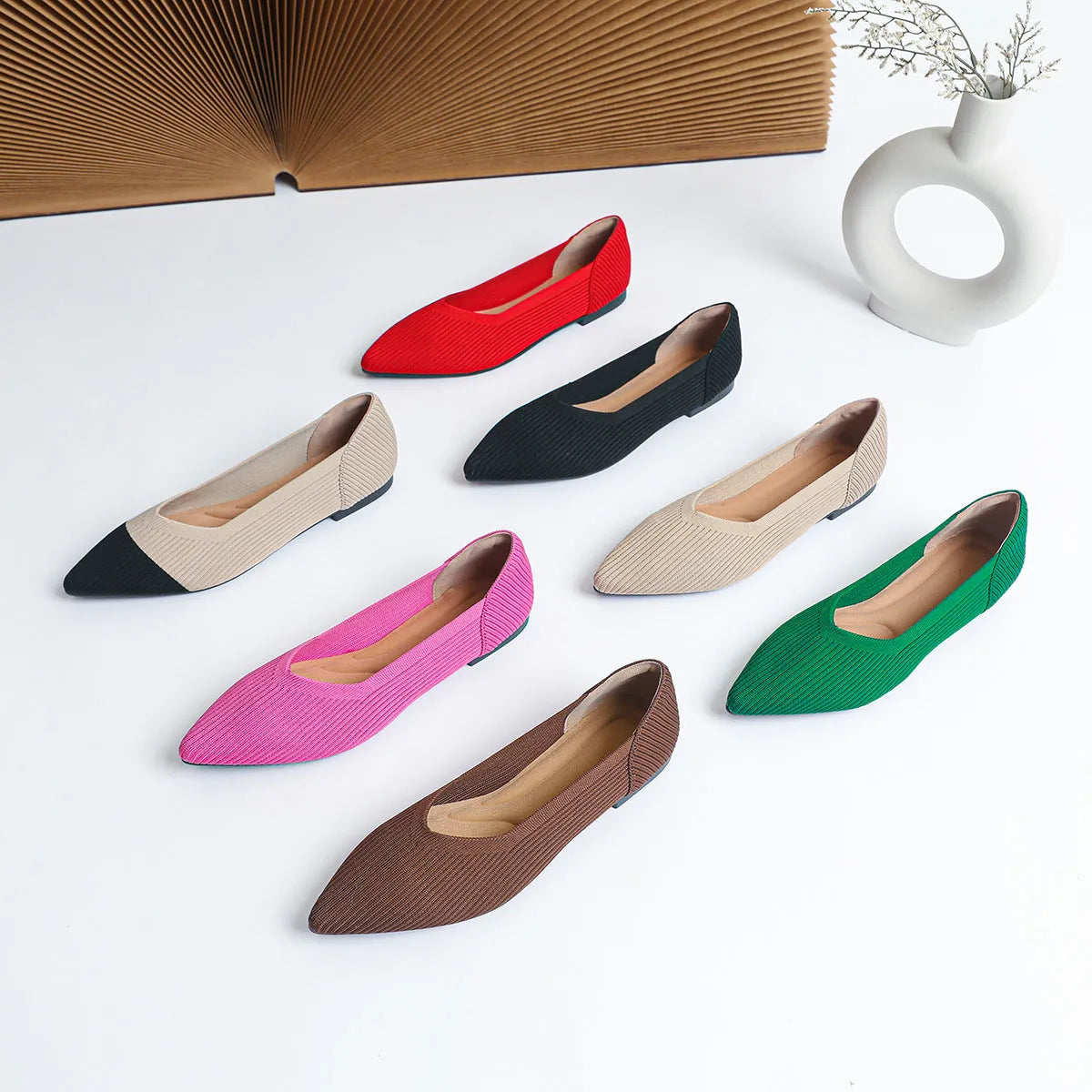 Women's apricot knit pointed flat pumps with a shallow mouth and rubber sole.