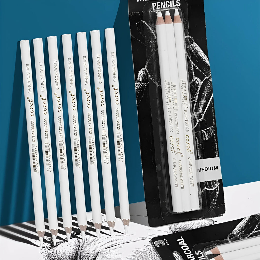Three white charcoal sketching pencils with wooden barrels in a set.
