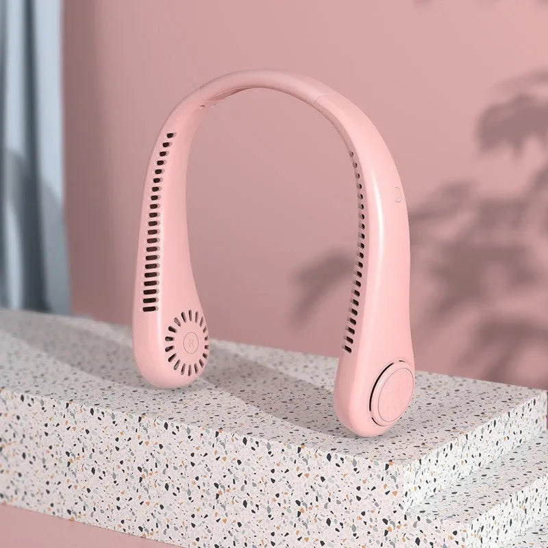 White USB rechargeable bladeless neck fan being worn, showing its flexible neckband and compact design.