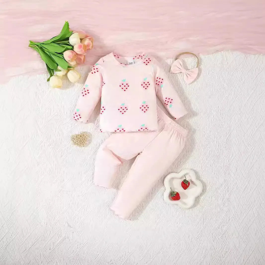 Infant wearing a light blue polyester 3-piece set with long sleeves, pants, and a matching hat.