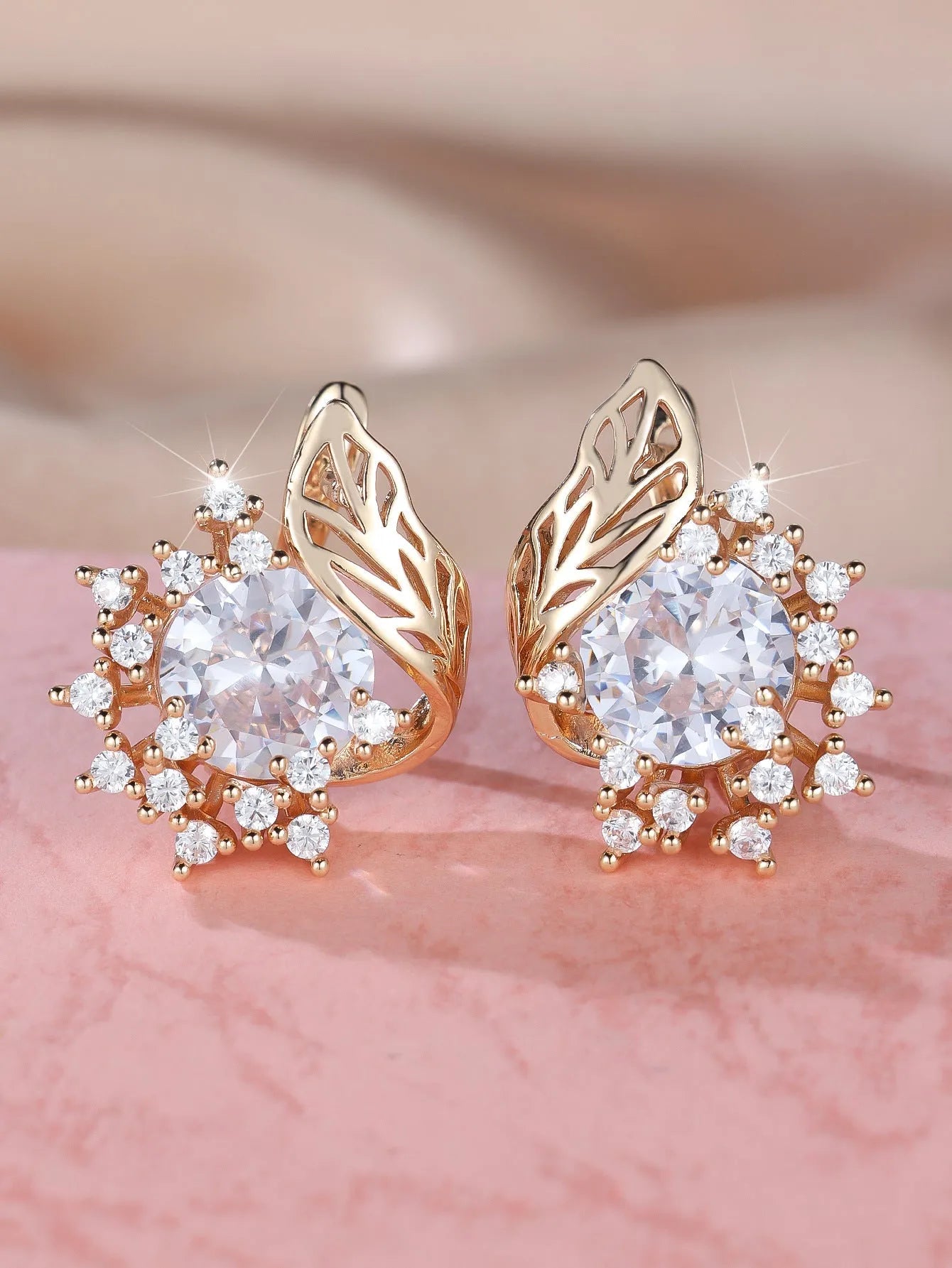 Rose gold round flower feather earrings with a choice of coloured zircon stones.