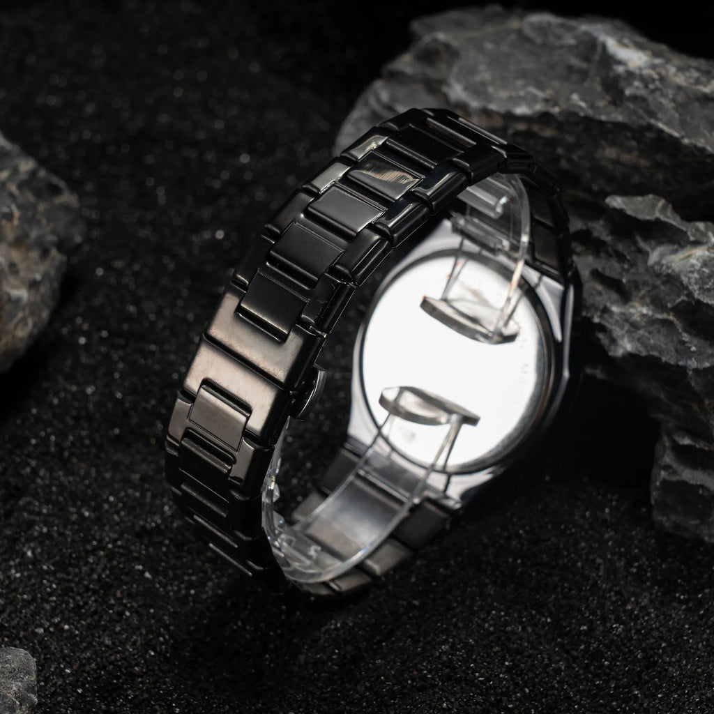 Men's business casual quartz watch with steel belt strap and 10mm thick case in black and silver colour options.