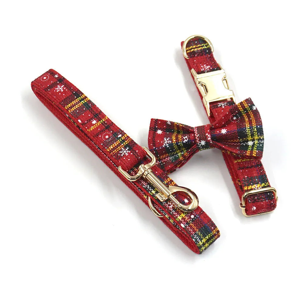 Red Christmas pet collar set with matching traction rope, bow, chest-back harness and waste bag holder