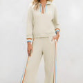 Apricot striped patchwork quarter zip pullover and loose pant set on model, women's two-piece loungewear