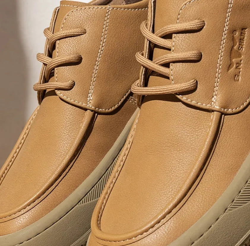 Brown retro casual leather shoes with big toe design and stitching, shown on a white background.