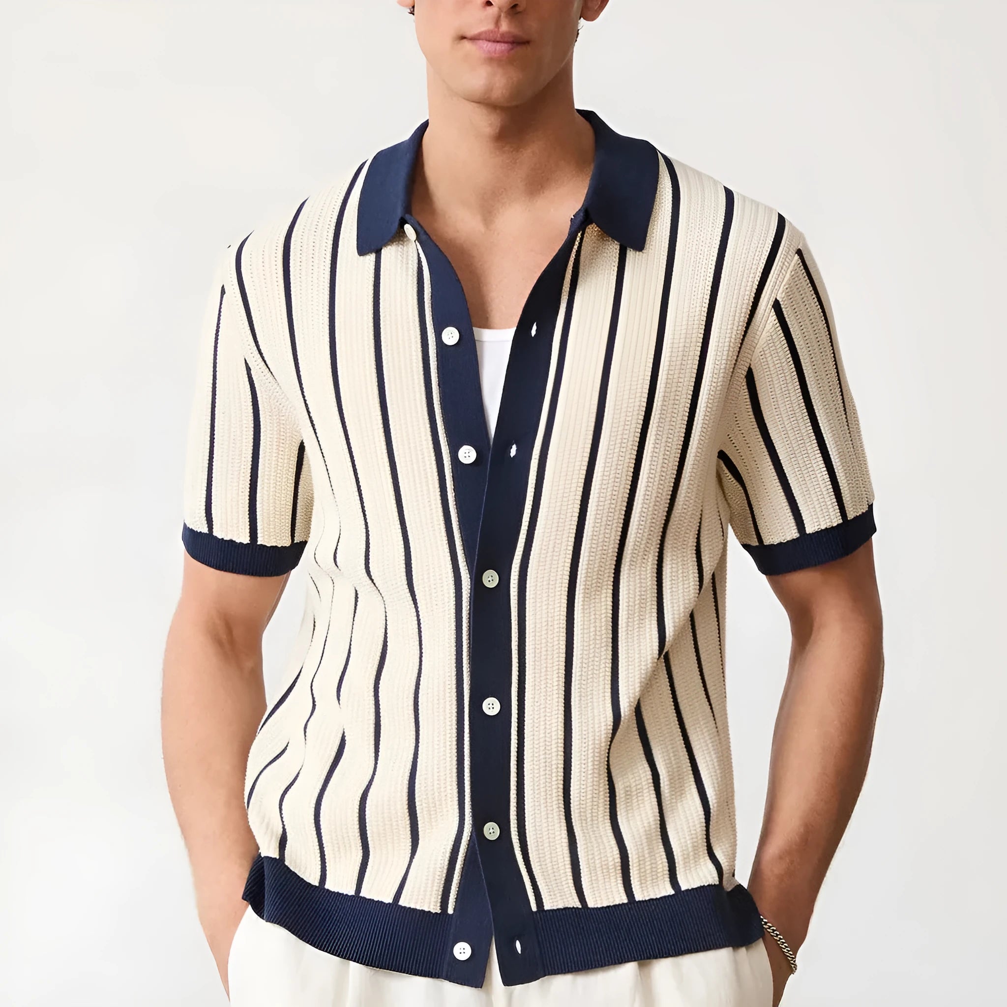 Men's white asymmetric lapel short sleeve knitted top laid flat, showcasing ice silk fabric texture.
