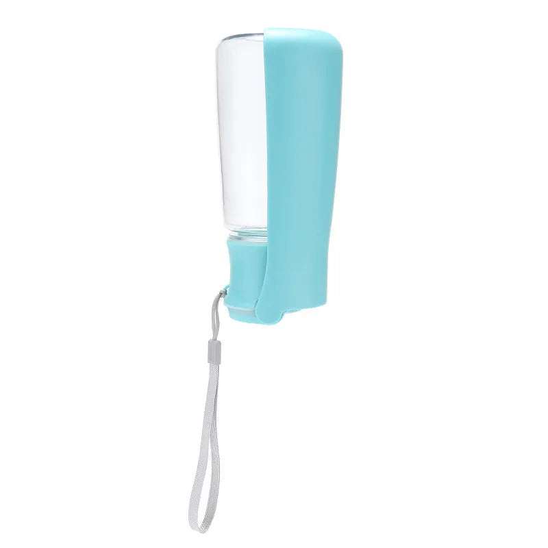 Blue foldable plastic dog water bottle with extended drinking bowl for outdoor use.