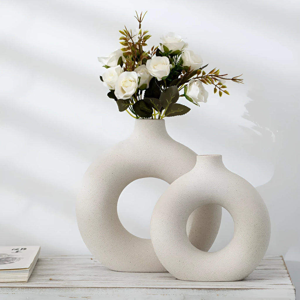 A simple modern frosted porcelain biscuit vase for flower arranging, shown in a neutral colour.
