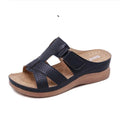 Women's red peep toe wedge sandals with Velcro strap on a fish mouth sole.